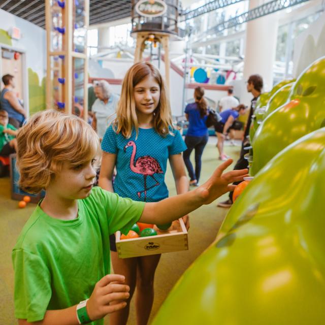 Orlando Science Center children with imaginary orange grove