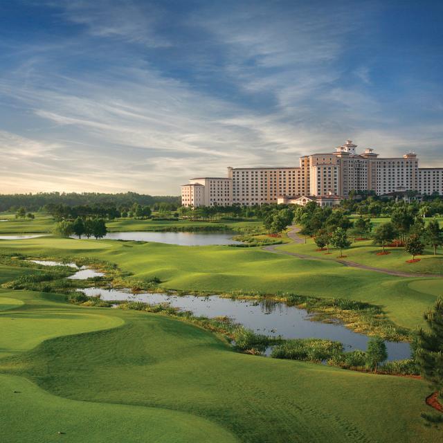 View of golf course and hotel exterior of Rosen Shingle Creek
