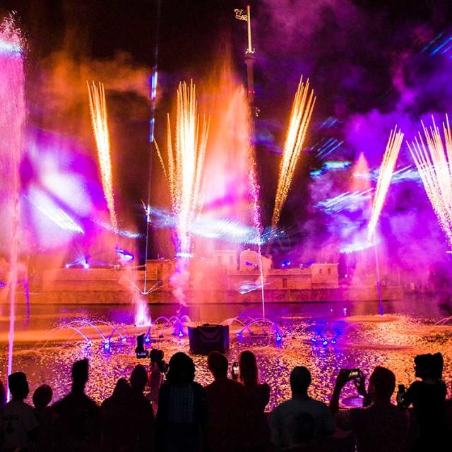 Guests watching fireworks during SeaWorld’s Electric Ocean
