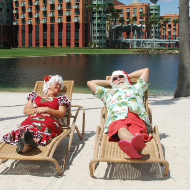 Santa and Mrs. Claus lounge at the Walt Disney World Swan and Dolphin Resort