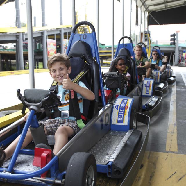 Thumbs up approval from a kid on a go kart at Fun Spot America Orlando.
