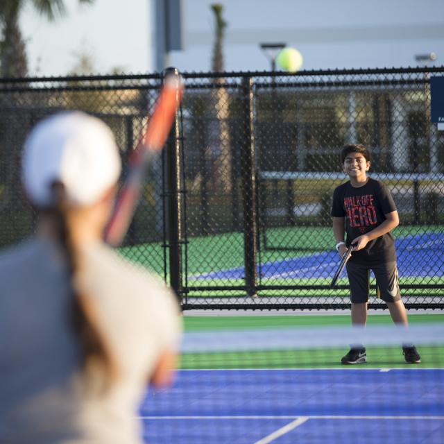 USTA National Campus boy playing at Nemours Family Zone
