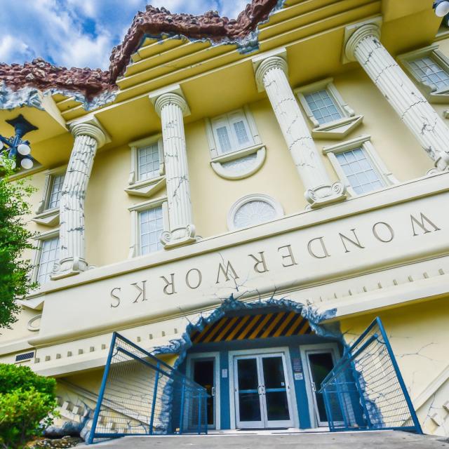 A closeup view of the front entrance to the WonderWorks attraction in Orlando, Florida.