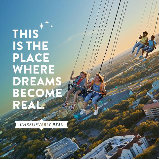 People soaring above International Drive at the Orlando Skyflyer attraction. This is the place where dreams become real.