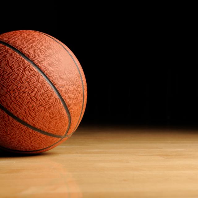 a basketball laying on the court