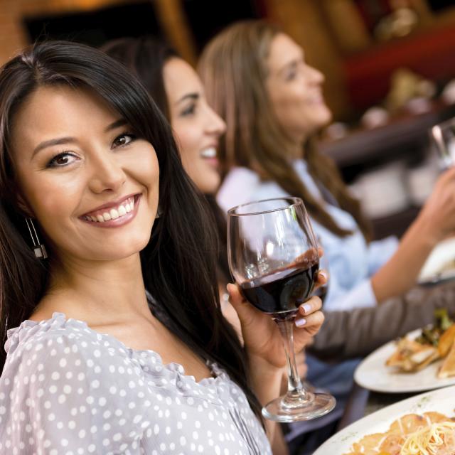 woman having dinner with friends