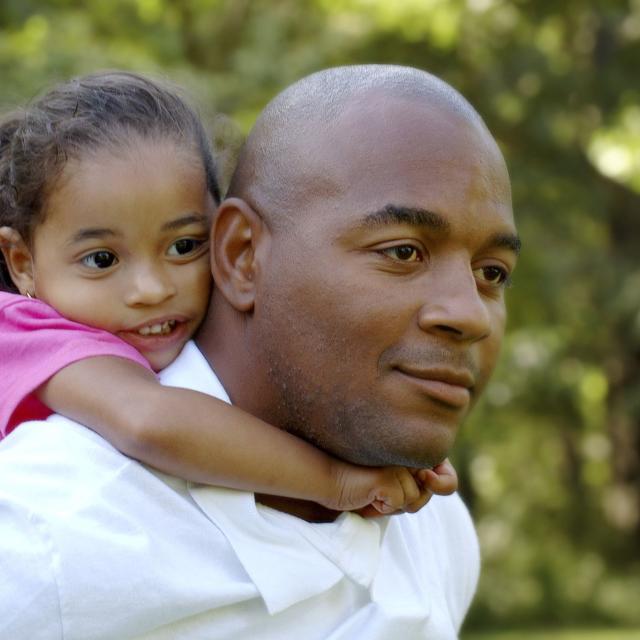 An African-American father and daughter