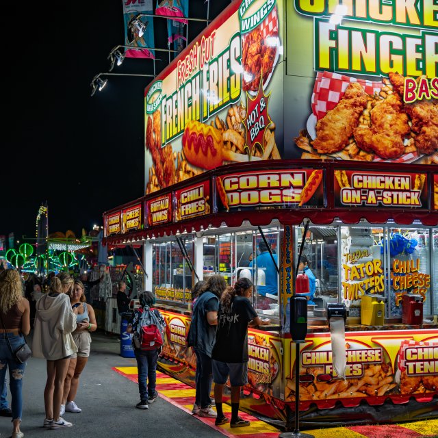 Fair goers enjoying the many food options at the West End Fair.