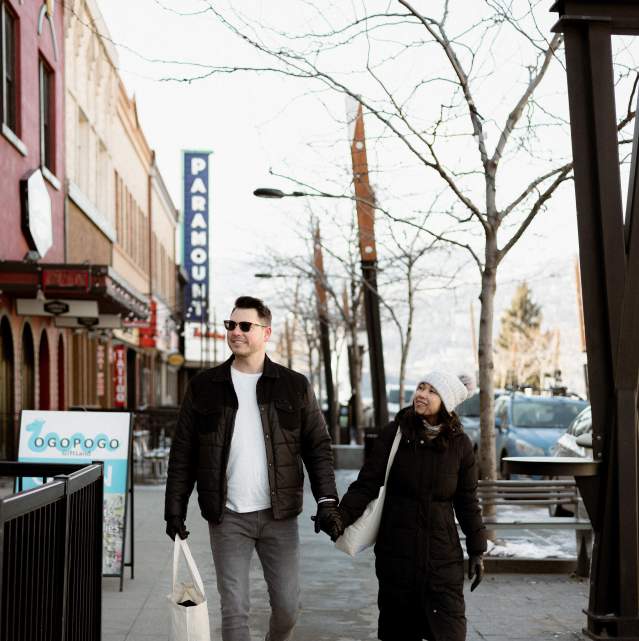 Couple Walking on Bernard Ave Downtown 3