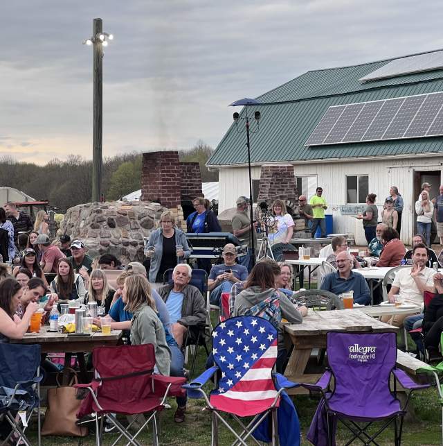 The crowd at Stoney Acres Pizza farm enjoys the day.