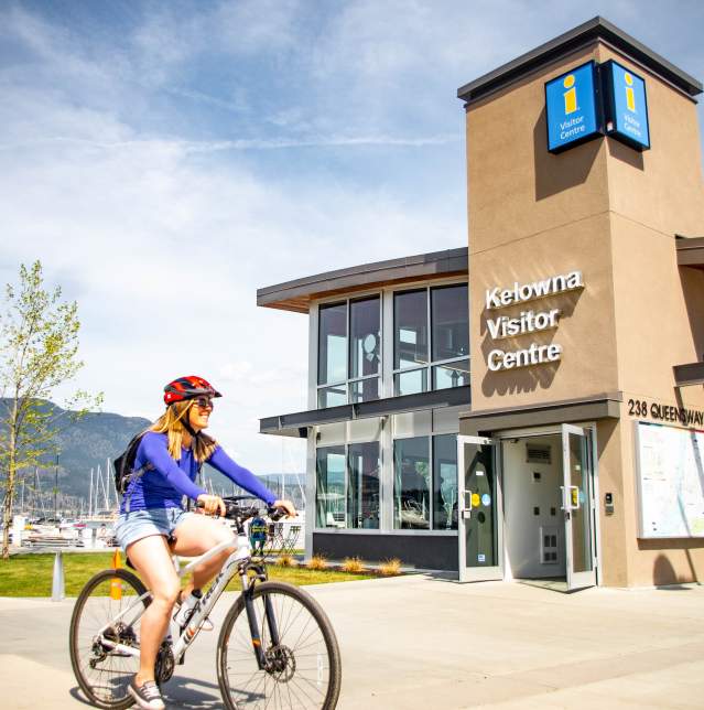 Biking by the Kelowna Visitor Centre