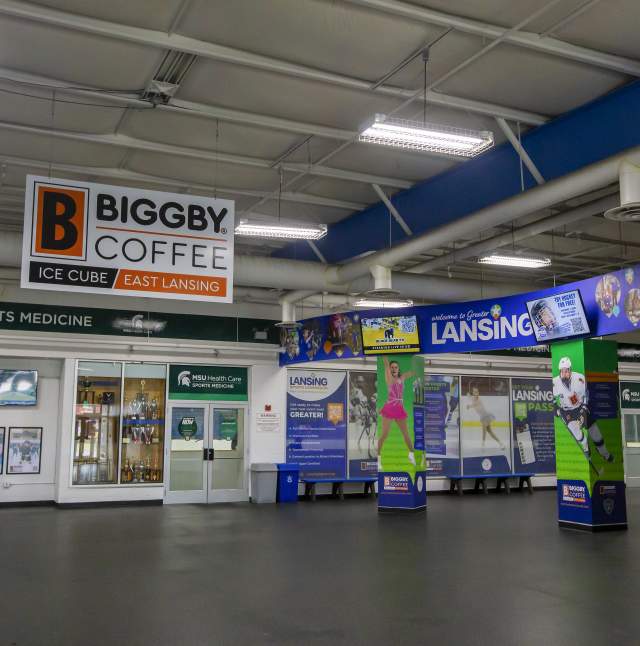 Lobby of the Biggby Coffee Ice Cube East Lansing with Welcome to Lansing signage