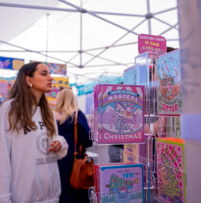 Young woman shopping at the Winter Fourth Ave Street Fair
