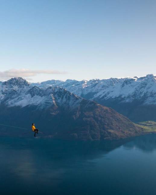 Highliner walks on rope suspended above Lake Whakatipu in Queenstown