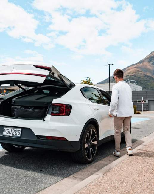 Driver picking up an electric car at Queenstown Airport