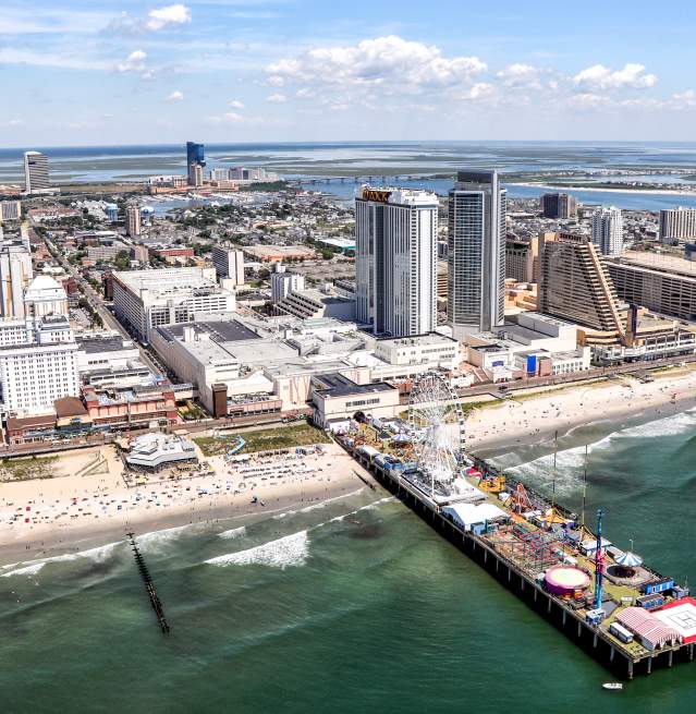 Aerial of Shoreline, Boardwalk, and City