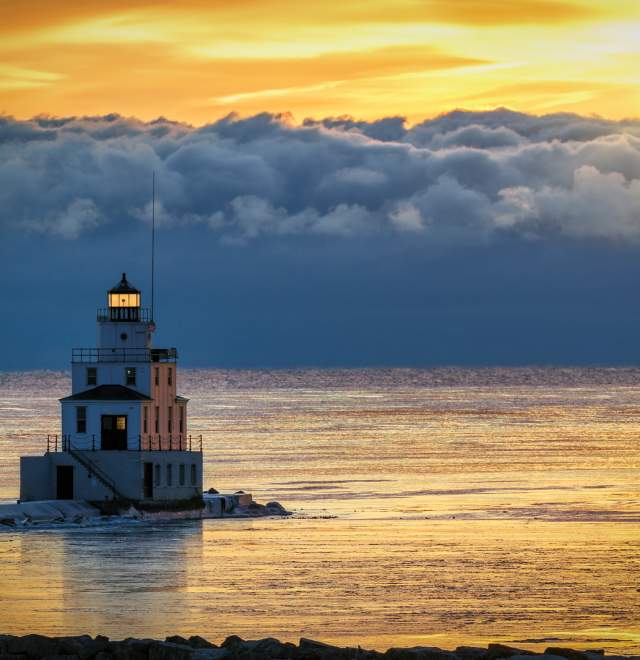 Manitowoc Breakwater Lighthouse with yellow sunrise
