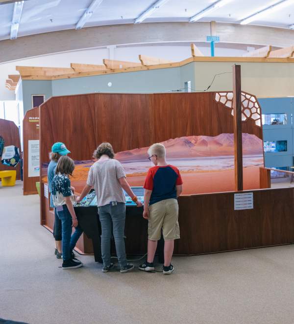 Family and child at an Science Zone exhibit in Casper, WY