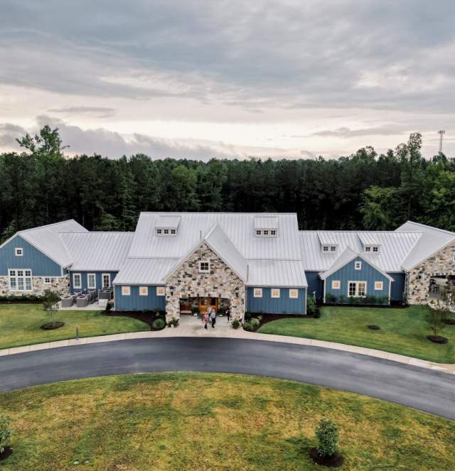 Aerial shot of a blue and stone building