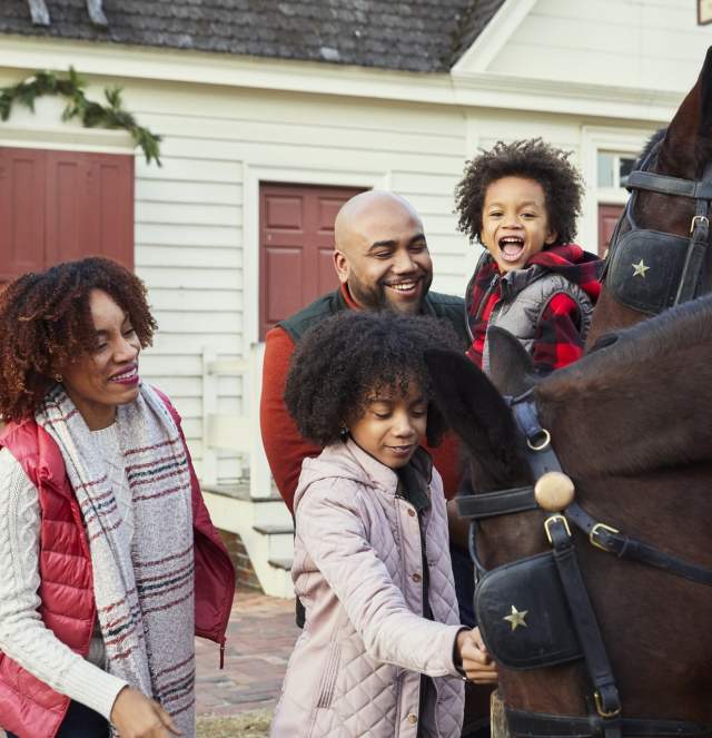 Family with horses at Colonial Williamsburg
