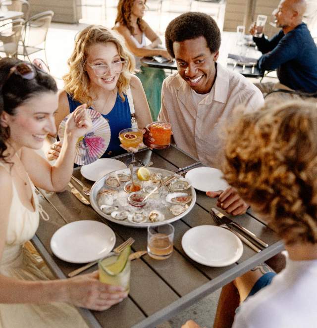 Group of Friends Dining at Casa Pearl