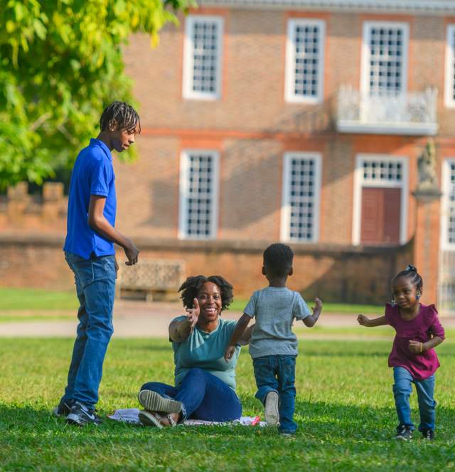 Family on the Governor's Palace Lawn