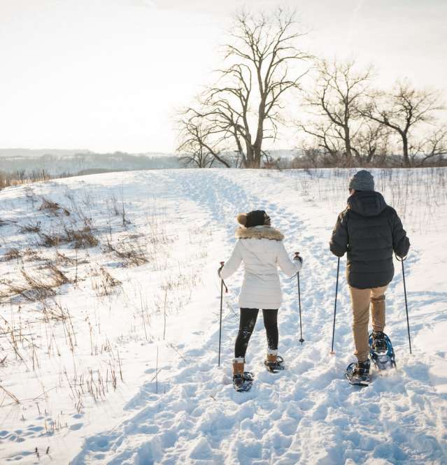 couple skiing on the slopes in Galena Country during the winter