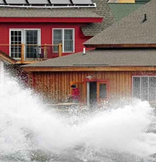 Waves knocking on North House Folk School door (Cathy Gray-Anderson photo)