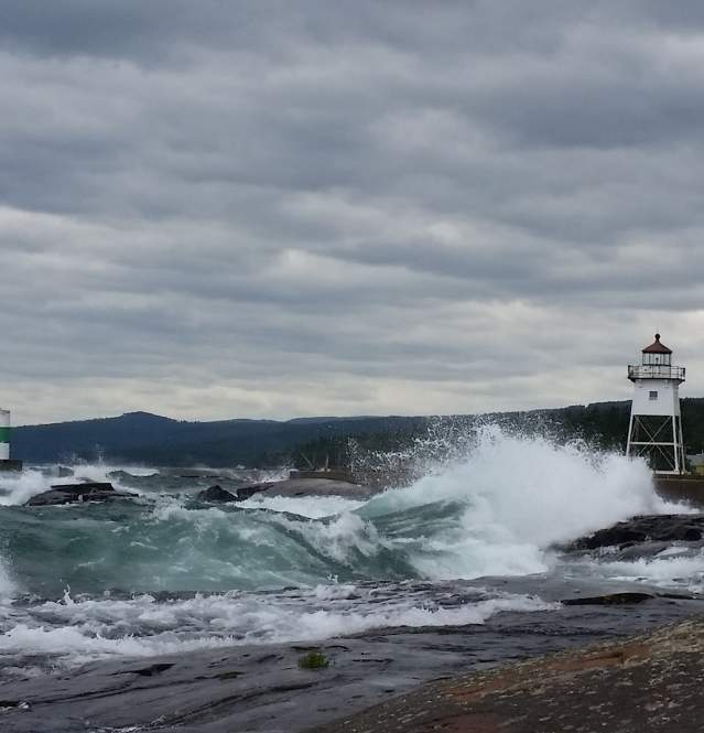 Waves breaking on artist point lighthouse