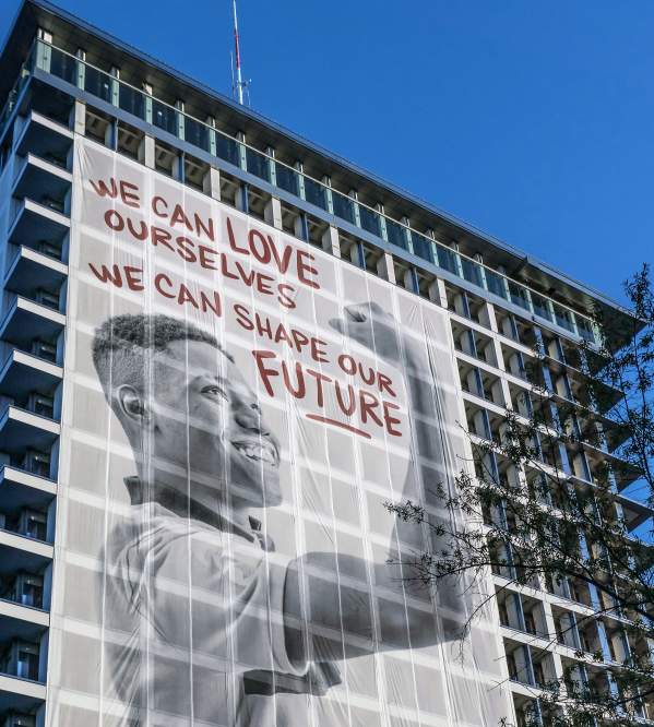 Richmond City Hall banner "We Can Love Ourselves. We can shape our Future"