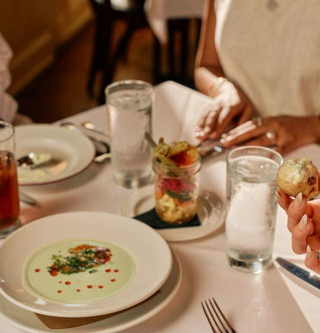 A photograph of lunch on the table at La Petite Grocery in New Orleans