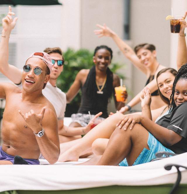 Group of friends enjoying the Bourbon Orleans pool
