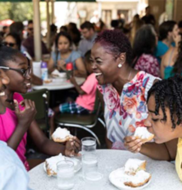 Family Eating Beignets