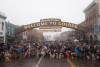 Group Photo Under Welcome to Golden Arch for Goldens in Golden event