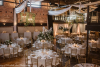 The Rose Event Center set up for a wedding with tables and decorations