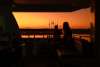 Unwind on deck as the Kimberley sky lights up at sunset.