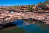 Enjoy a swim in a crystal-clear freshwater oasis after a scenic hike.
