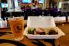 Tacos and a pint of golden ale with the Blue Raven Brewy logo on the.