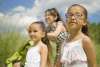 two girls and their mom walking