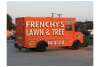 And orange truck that reads "Frenchy's Lawn & Tree"
