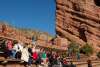 group outside at Red Rocks during the day listening to presenter