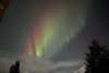 Rainbow colored northern lights ove Piedad road. Haines, Alaska