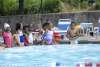 Group of kids learning to swim