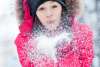 Woman Playing in NY Snow