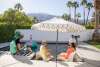Group around pool at vacation rental.