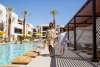 Two women poolside at the Drift Hotel