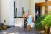 Two women with shopping bags walking out of Kimpton Rowan.
