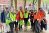 A group posing outside while volunteering for Pick Up The Poconos