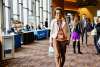 A women walking through the vendor showcase at More Front Doors: The Pocono Housing Summit