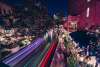 River Walk with holiday lights and glow from river barge
